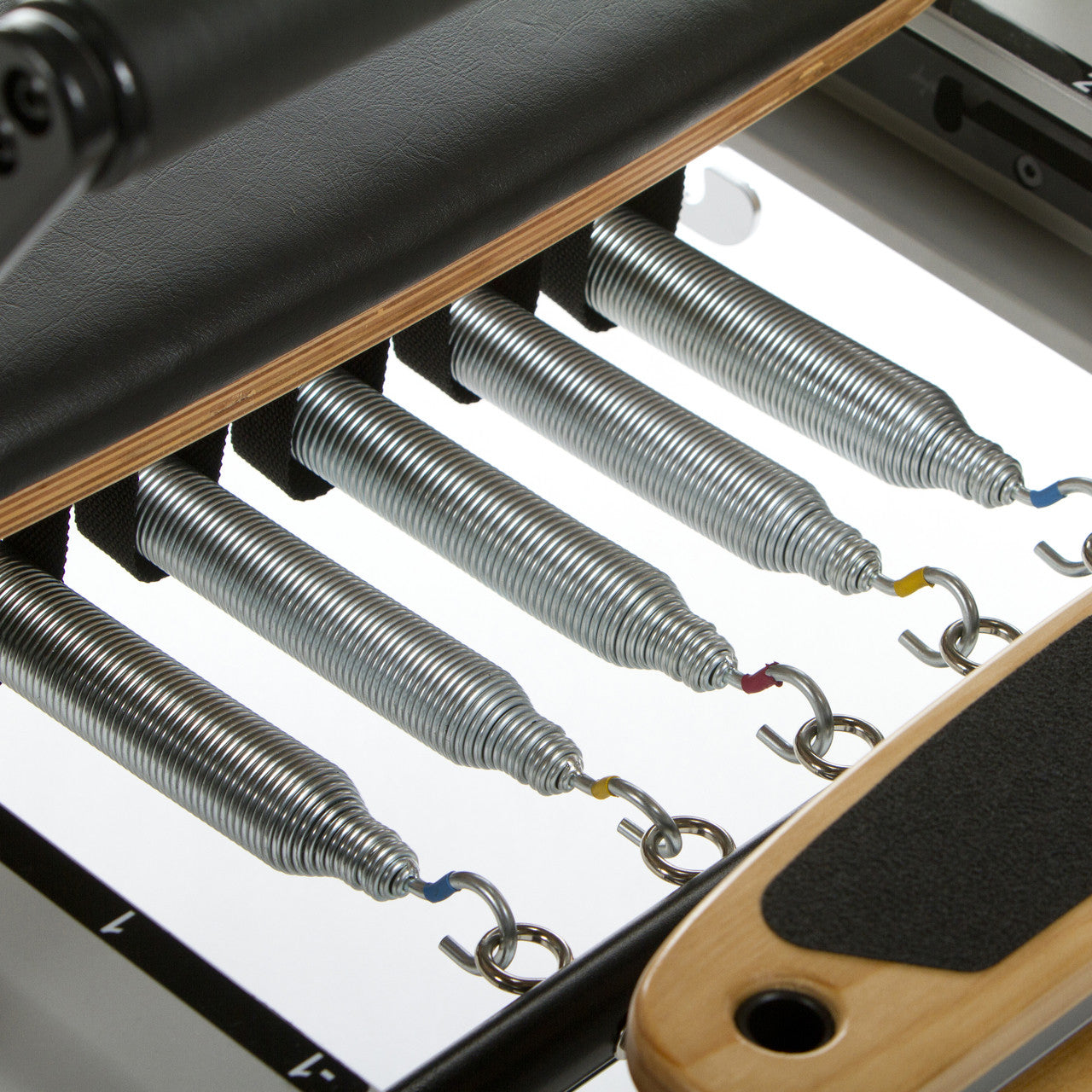 Professional Studio Reformer with Large Footplate, Adjustable Four-Position Gear Bar, Locking Foot Bar, Vertical Storage Design, and Integrated Side-Split Platform for Group Classes